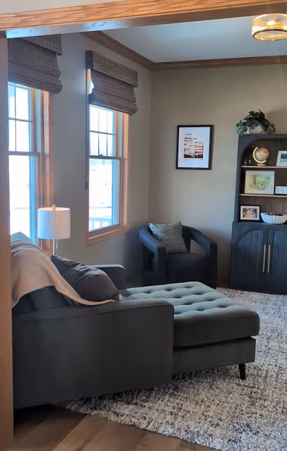 Celebration front room with a green velvet chaise lounge