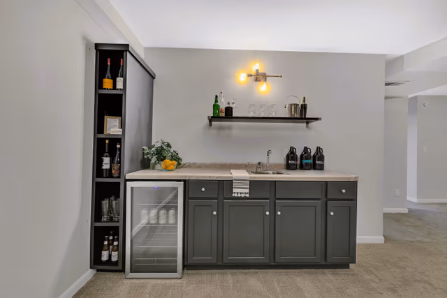 Basement — wet bar with wine storage and beverage fridge — Sartell, MN remodel by Simply Enhanced Homes