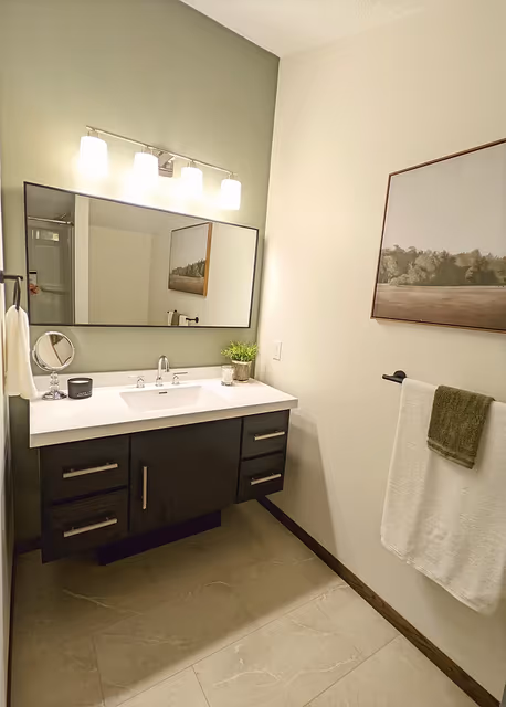 Main bathroom — floating vanity — St. Cloud, MN remodel by Simply Enhanced Homes