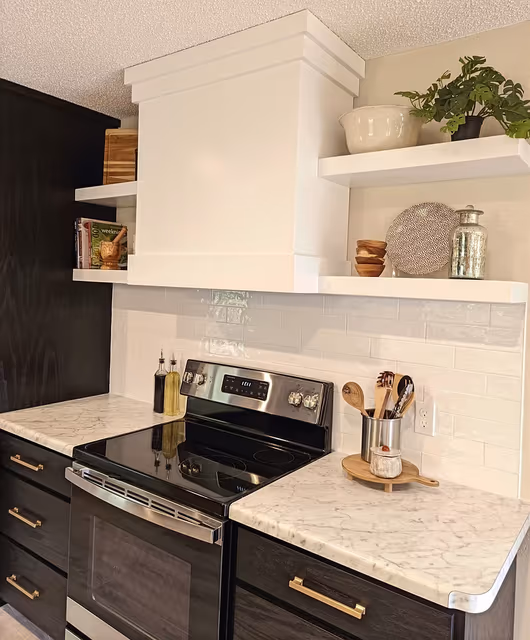 Kitchen — hood vent with modern trim details and open shelving — St. Cloud, MN remodel by Simply Enhanced Homes