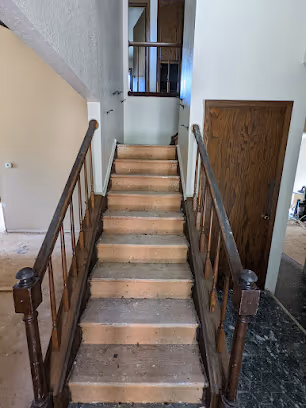 Before — stair railing — St. Cloud, MN remodel by Simply Enhanced Homes