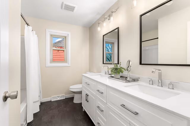 Main bathroom — changed from a single-sink to a double-sink vanity — St. Cloud, MN remodel by Simply Enhanced Homes