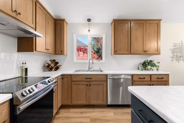 Kitchen — vertical offset subway tile backsplash — St. Cloud, MN remodel by Simply Enhanced Homes